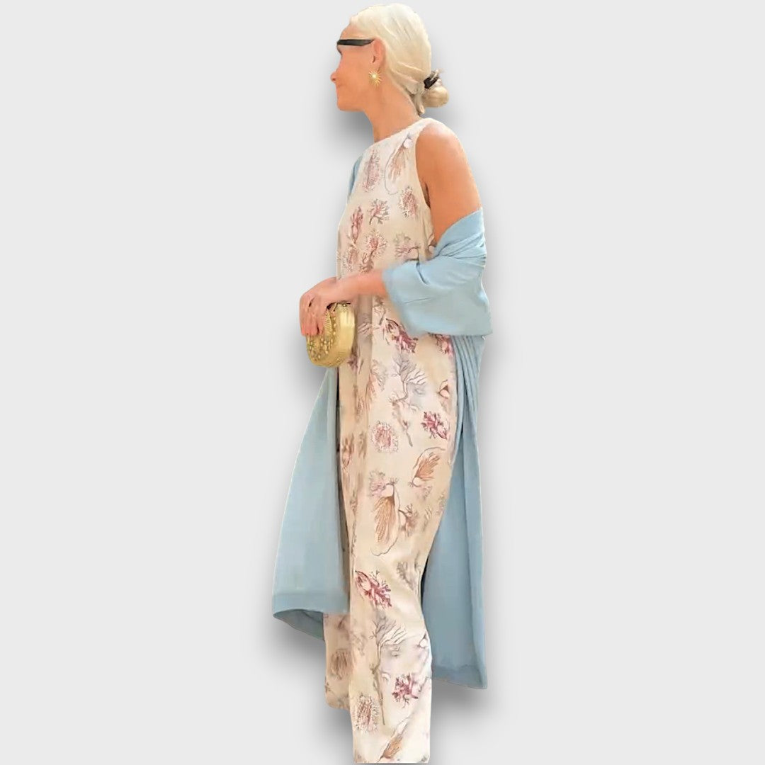 Elveria - Maxi suknelė su kardiganu" can be rewritten as "Elveria - Maxi Dress with Cardigan.