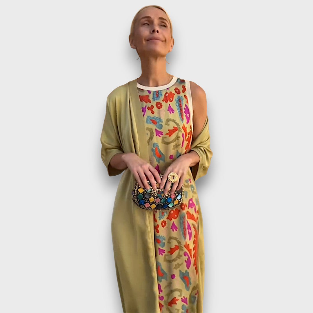 Elveria - Maxi suknelė su kardiganu" can be rewritten as "Elveria - Maxi Dress with Cardigan.