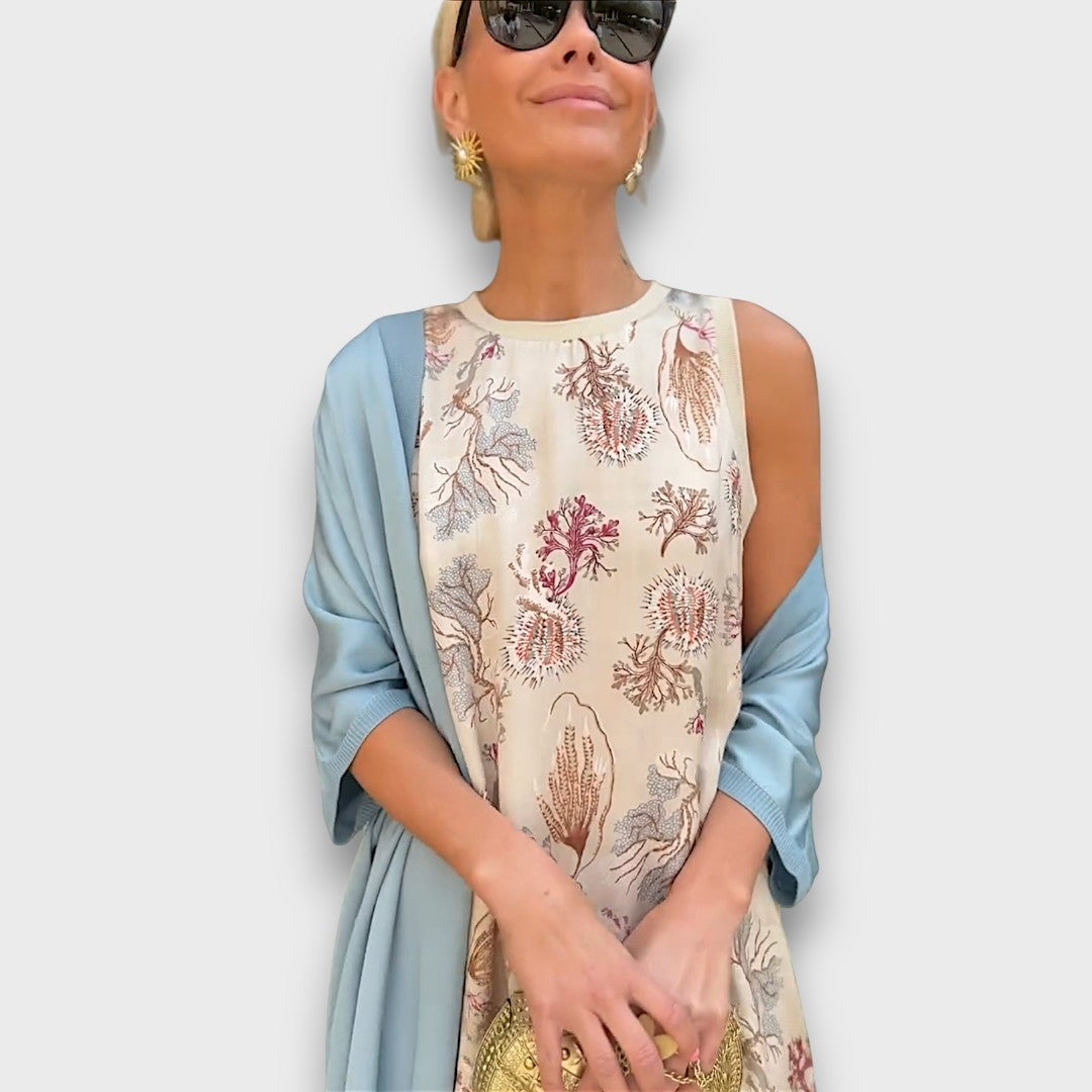 Elveria - Maxi suknelė su kardiganu" can be rewritten as "Elveria - Maxi Dress with Cardigan.